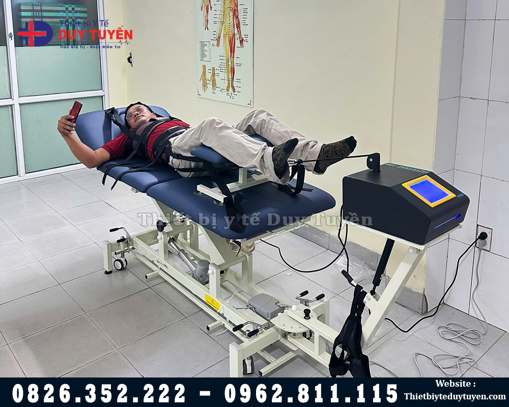 giường và máy kéo giãn fizyotrac 100